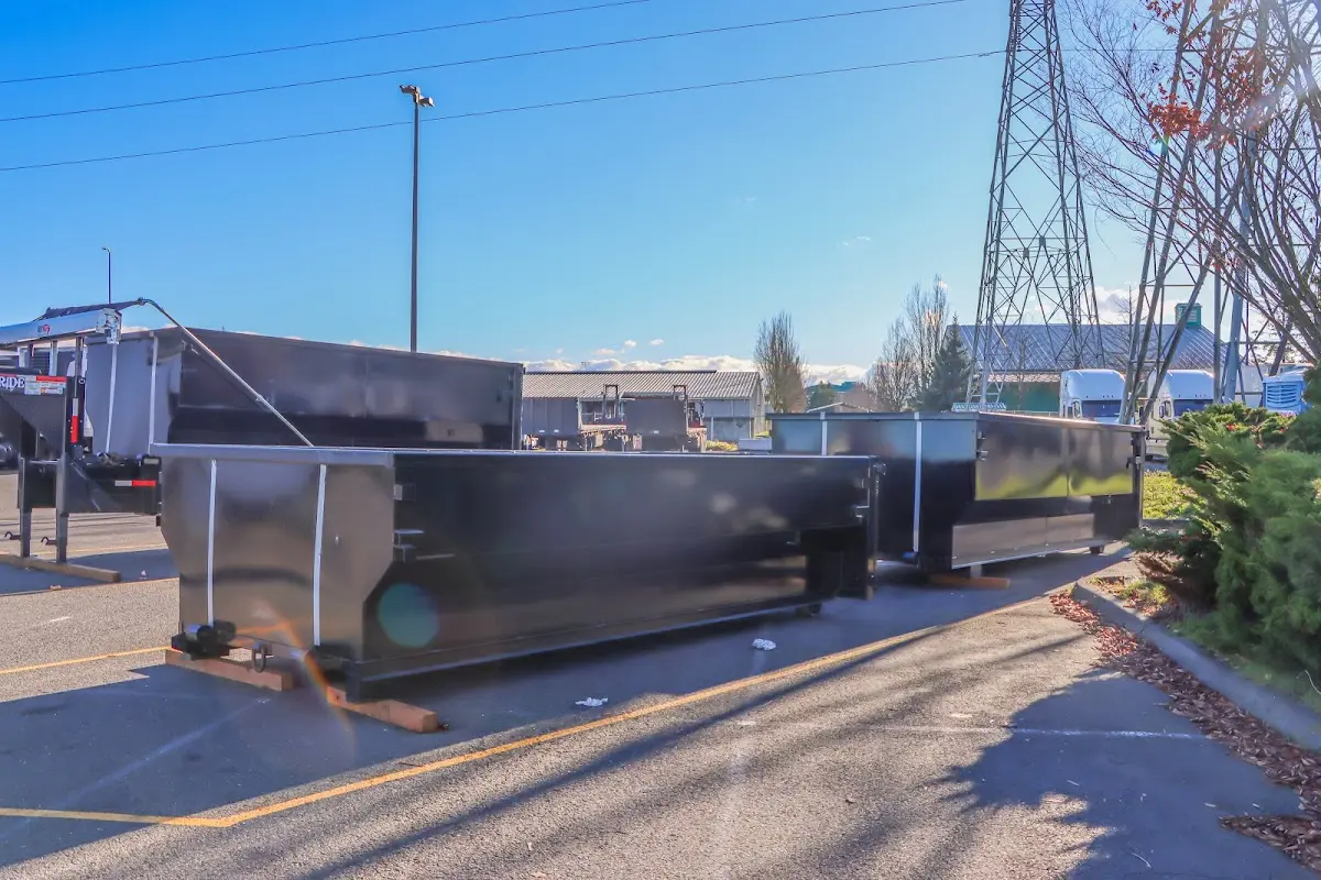 Roll-off dumpster ready for waste disposal at job site for 2 Yard Dumpster Rental in Country Homes